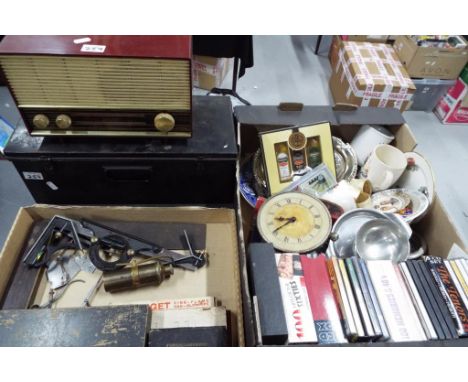 A large mixed lot to include ceramic tableware, drawing accessories, a metal chest, vintage radio model no.R33, CD's, clock, 