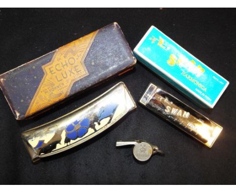 A Swan harmonica model # NH13 - 417, a ECHO - LUXE harmonica made by M.Hohner, Germany, both boxed also included in lot is a 