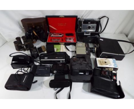 Photography - a quantity of cameras to include a Minolta 16MGS, a Sankyo 8CM, a Minox 35EL, a Polaroid Land camera Automatic 