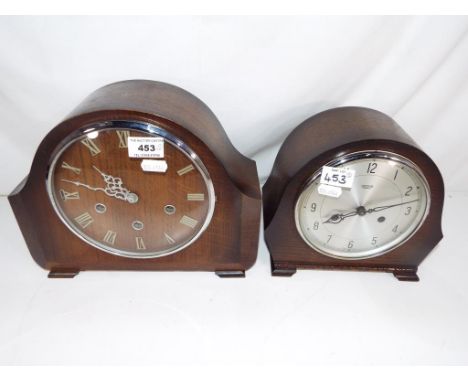 An oak case Smiths Enfield mantel clock with pendulum and key and a further oak case mantel clock with Smiths movement with k