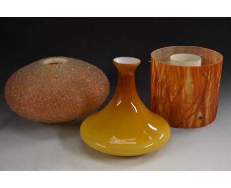 A 1960s Rotaflex compressed ovoid lamp shade, in bands of bright orange, the surface overlaid with clear plastic chipped glas