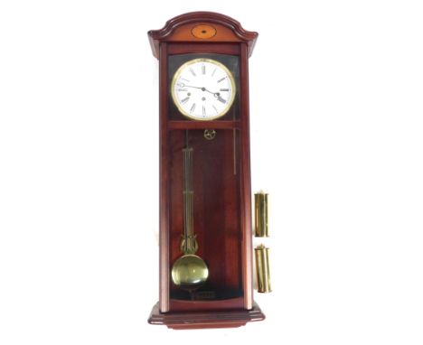 A mahogany and inlaid cased wall clock, the circular white enamel dial, bearing Roman numerals for Rapport, London, eight day