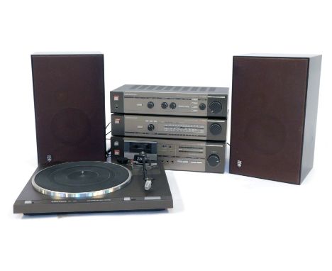 A Grundig Stereo system, comprising turntable PS1700, integrated Stereo amplifier, LM-MW-FM tuner, Stereo cassette deck and s