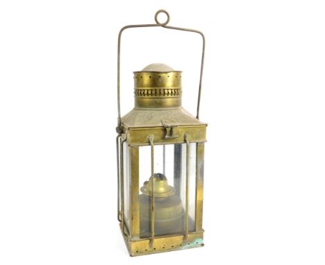 A brass oil ship's lantern, of square form with ring handle, 38cm high. 