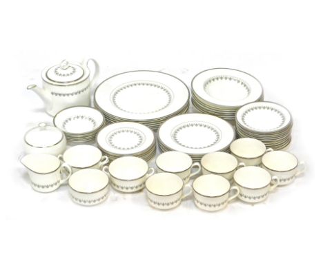 A Royal Worcester part tea and dinner service decorated, in the Silver Frost pattern, to include dessert bowls, soup plates, 