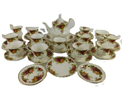 A group of Royal Albert part teawares decorated in the Old Country Roses pattern, comprising teapot, milk jug, eleven teacups