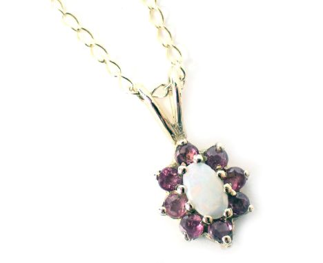 A 9ct gold pendant and chain, the floral cluster pendant set with opal and garnet, on a fine link neck chain, the pendant 1.5