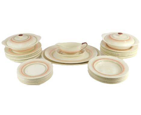 A Grays pottery part dinner service decorated in the Art Deco style, each piece decorated with banded grey and graduated pink