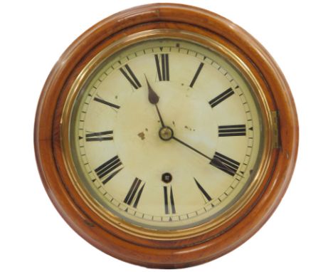 A mahogany cased wall clock, circular cream enamel dial bearing Roman numerals, thirty hour movement, circular mahogany case,