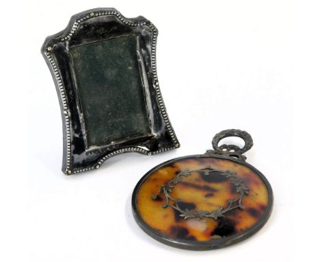 A George V miniature silver framed mirror, the miniature easel back mirror Birmingham 1916, 6.75cm high, and another circular