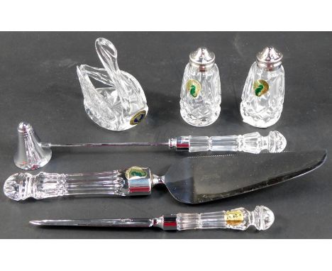 A group of Waterford crystal, comprising salt and pepper shakers, candle snuffer, cake slice, letter opener and swan shaped t