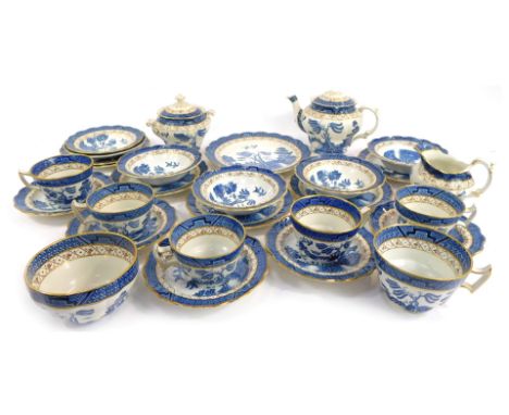 A Booths pottery part tea service decorated in the Real Old Willow pattern, to include teapot, lidded sugar bowl, teacups and