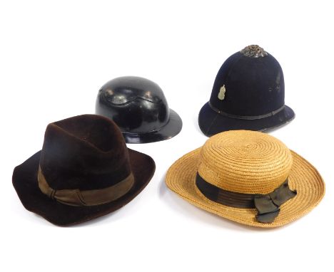 A group of hats, comprising a Police hat with ARP badge, straw boater, a GA Dunn and Co brown felt hat, and a Cromwell Protec