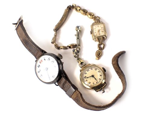 Three wristwatches, comprising a 1960s silver cased wristwatch head, with a white enamel numeric dial and gold outer batons, 