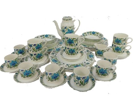 A Midwinter part coffee, tea and dinner service, each piece decorated with blue and green flowers against a white ground, com