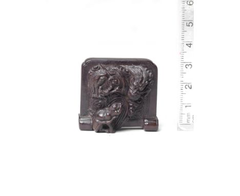 A wood netsuke of a standing screen with a dragon and tigerBy Tametaka, Nagoya, 18th centuryThe tsuitate (free-standing scree