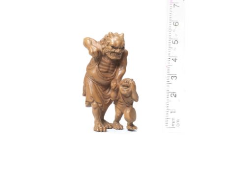 A late wood okimono-style netsuke of Raiden and RaitaroLate 19th centuryThe former standing, berating his terrified son, thre