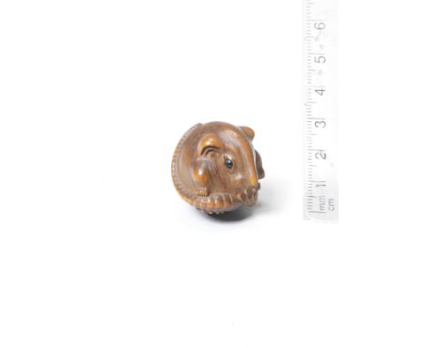A wood netsuke of a ratBy Masakazu, 19th centuryThe small rat of spherical form, its stubby limbs, facial features and tail d