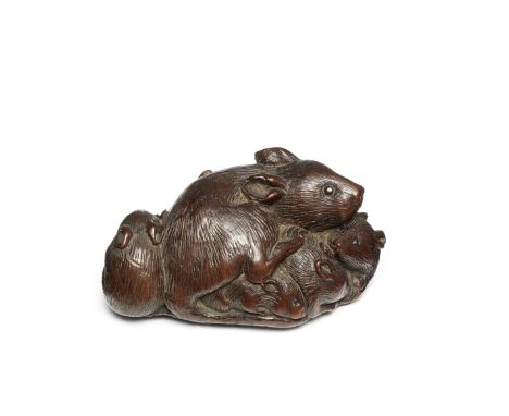 A wood netsuke of a family of ratsBy Tametaka, Nagoya, circa 1770-1780The large parent crawling over and around its six young