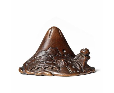 A boxwood netsuke of Saigyo Hoshi viewing Mount FujiBy Nagamitsu, late 18th/early 19th centuryThe poet and priest Saigyo Hosh