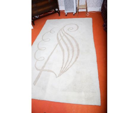 2 matching cream wool rugs with a light brown design. 249 x 157 aprox (2)both rugs are in need of cleaning, with marks from u