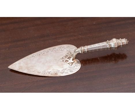 A Victorian silver Trowel, the heart-shaped blade engraved with a border  of fruiting vine, the tapering octagonal handle app