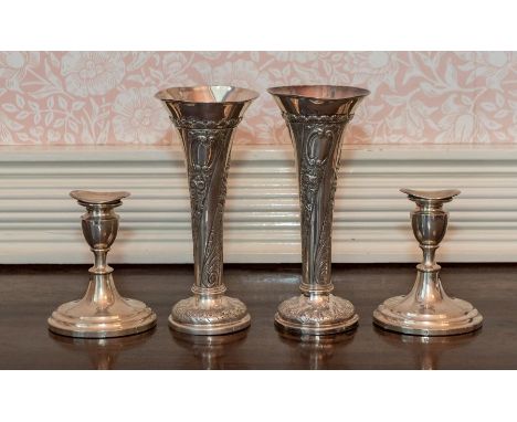 A Pair of Victorian silver trumpet Vases, embossed floral leafage scrolls and  acanthus leaves, on circular bases, Sheffield 