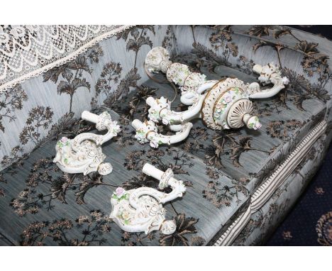 A Naples flower encrusted porcelain three branch chandelier and a pair of single branch matching wall sconces, c1960-70, blue