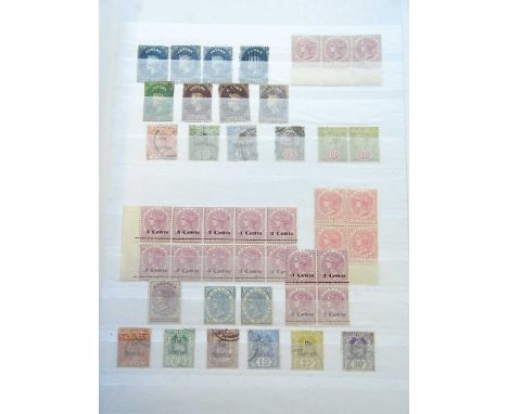 Ceylon Accumulation of 400 mainly mint stamps housed in a stockbook, a majority in multiple format. Inlcudes imperfs with use