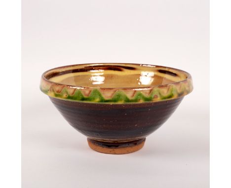 Clive Bowen (born 1943), a stoneware bowl, green wavy border, yellow interior, brown exterior, unmarked, 20cm diameter, 10cm 