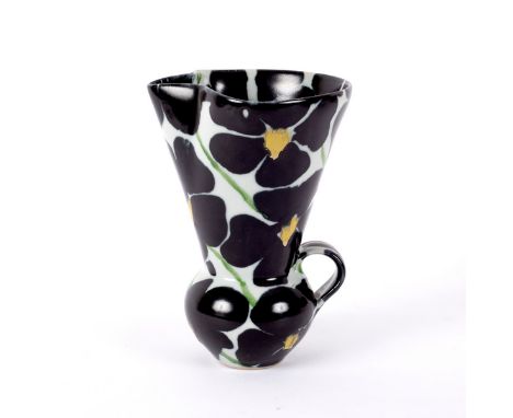 Janice Tchalenko (born 1942), a large stoneware jug, white glaze with black floral decoration, impressed marks, 26.5cm high C