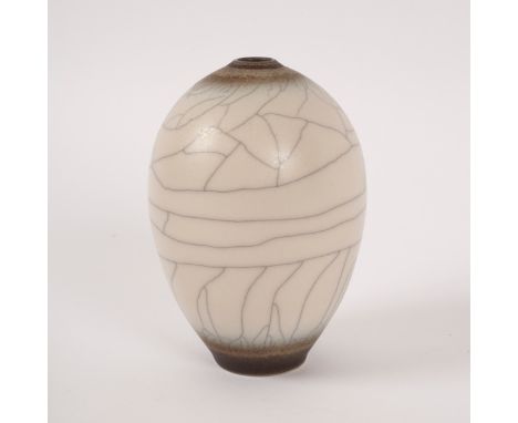 David White (1934-2011), an ovoid porcelain vase, white crackled glaze, impressed mark, 13cm high CONDITION REPORT: ARR Artis