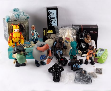 Kid Robot A Munny Son of Man figure, London Police Lad &amp; Dog vinyl figures, boxed set and a quantity of unboxed figures, 