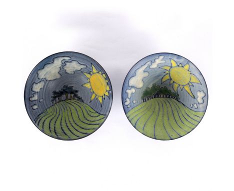Tessa Fuchs (1936-2012), a pair of earthenware bowls, each of conical form, blue glaze exterior, the interior painted a lands