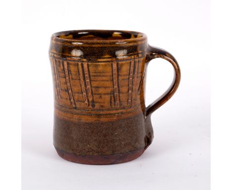 Ray Finch (1914-2012) for Winchcombe Pottery, a glazed stoneware mug decorated vertical brush lines to body and handle, impre