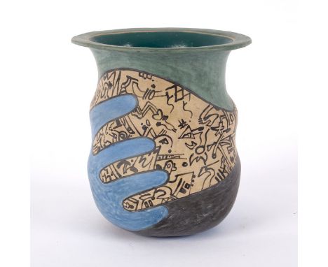 Neil Ions (born 1949), an earthenware vase of oval form and serpentine sides painted graffiti designs within the outline of a
