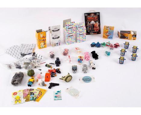 A box containing a quantity of loose figures and boxes including Medicom, Kaws, Kid Robot, etc.