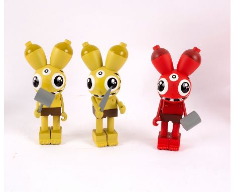 Two Dalek Kid Robot Space Monkey vinyl figures, yellow, boxed and a red Kobot figure similar (3)