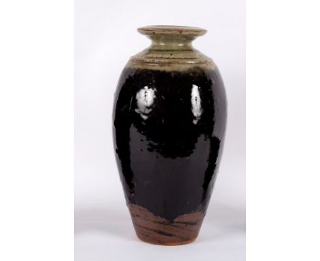 Richard Batterham (born 1936), a stoneware vase of tapering form with flared neck, celadon glaze with ribbed bands to shoulde