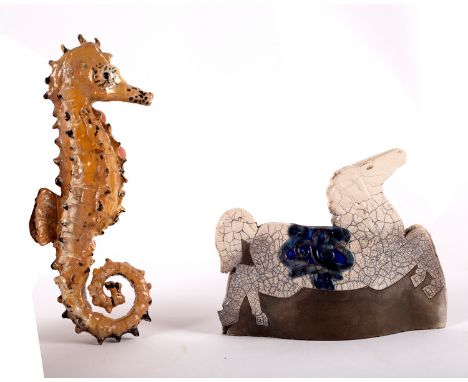 Ann Stokes (1922-2014), an earthenware figure of a seahorse, with mottled yellow, brown and black glazes, 25cm high, together