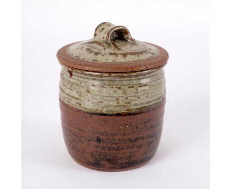 Richard Batterham (born 1936), a lidded storage jar, ash and tenmoku glazes, 13.5cm high CONDITION REPORT: ARR Artist's Resal