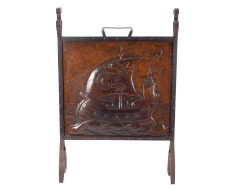An Arts & Crafts Newlyn style copper firescreen, the central panel embossed galleon with dragon to the sail and waves beneath