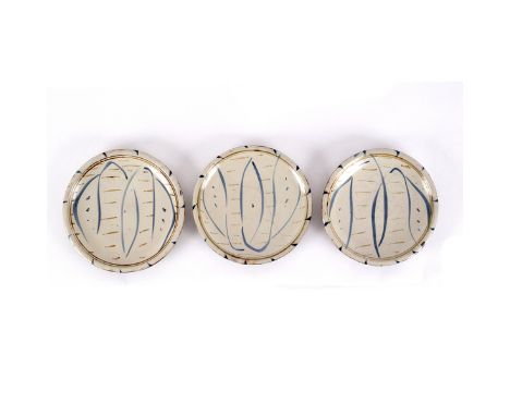 Michael Cardew (1901-1983) for Wenford Bridge Pottery, three stoneware plates, each painted with pale blue leaf motif and bro