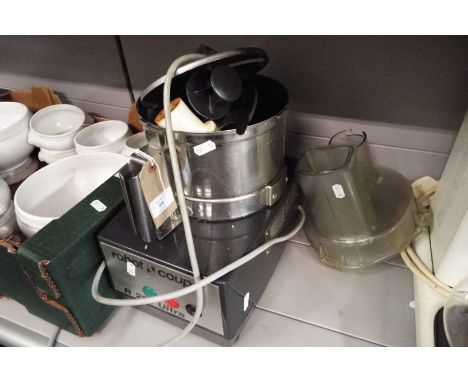 A Robot & Coupe R201 ultra cheese shredder