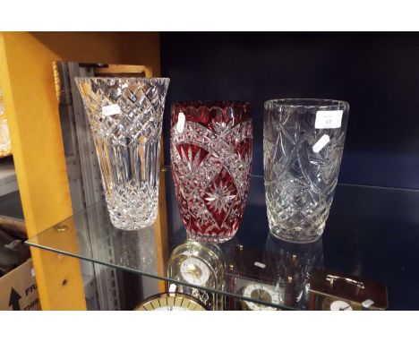 Two crystal glass vases and a ruby red acid etched glass vase