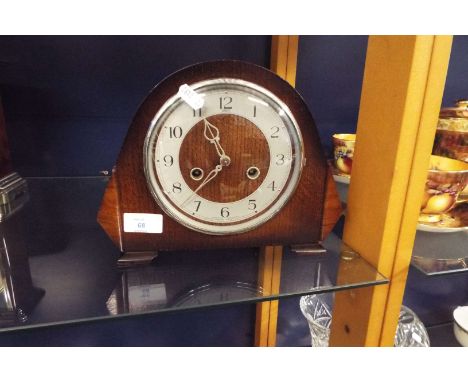 An oak cased 'Dupontic' mantel clock