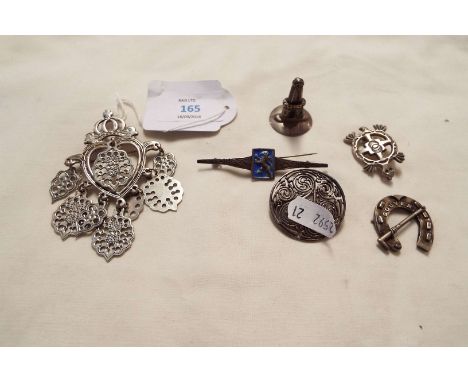 A selection of silver brooches to include Celtic examples