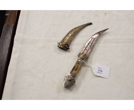 A Syrian dagger having bone handle in engraved metal scabbard