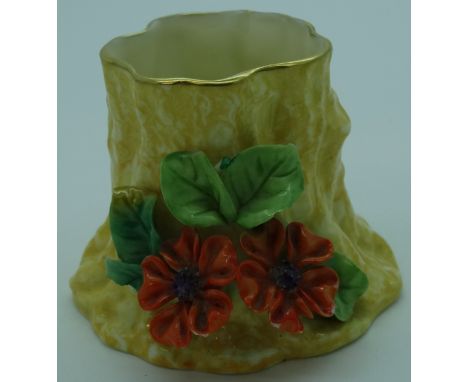 Small Royal Worcester yellow trunk form vase adorned with Primula 2.5'h 