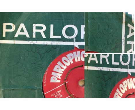 THE BEATLES PARLOPHONE SLEEVE SIGNED BY JOHN AND PAUL. A copy of Please, Please Me (45-R 4983) signed to paper parlophone sle